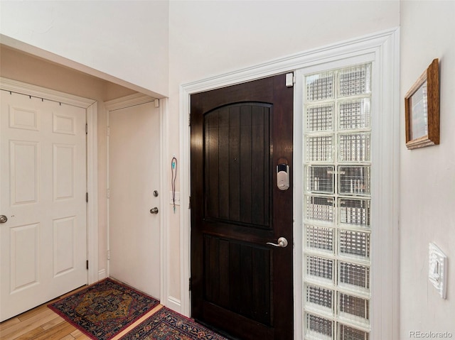 entrance foyer with hardwood / wood-style floors