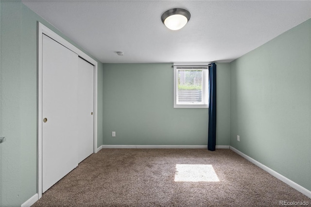 1540 Filbert Ct, Denver, CO 80220 - unfurnished bedroom featuring carpet, a closet, and baseboards