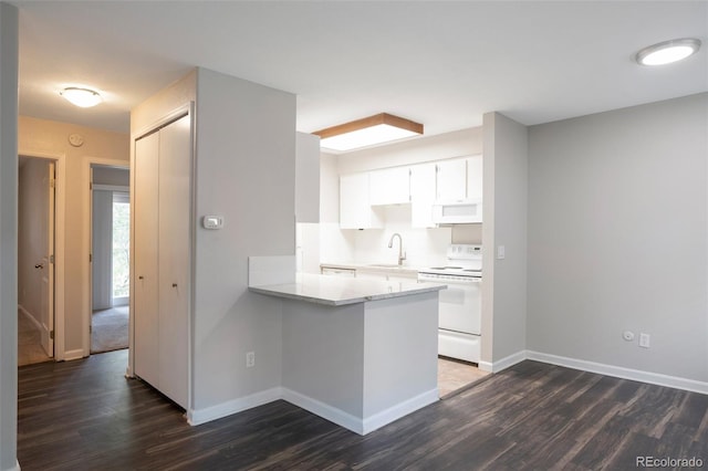 5770 E Warren Ave Unit 206, Denver, CO 80222 - kitchen featuring white appliances, dark wood-type flooring, white cabinets, and light countertops