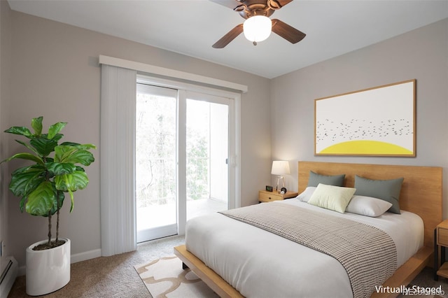 5770 E Warren Ave Unit 206, Denver, CO 80222 - bedroom featuring access to exterior, carpet floors, and baseboard heating