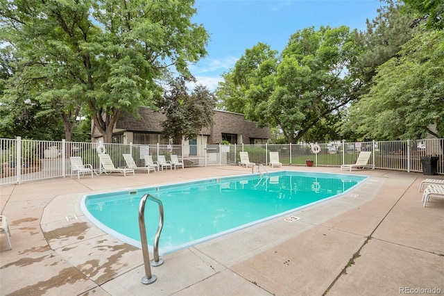 5770 E Warren Ave Unit 206, Denver, CO 80222 - community pool featuring a patio area