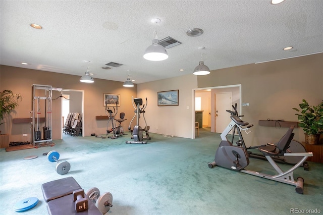 5770 E Warren Ave Unit 206, Denver, CO 80222 - exercise room featuring carpet and a textured ceiling
