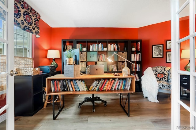 2061 Chesapeake Pl, Highlands Ranch, CO 80126 - living area featuring wood finished floors, a desk, and french doors
