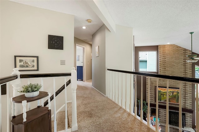 2061 Chesapeake Pl, Highlands Ranch, CO 80126 - corridor with carpet flooring, an upstairs landing, recessed lighting, and a textured ceiling