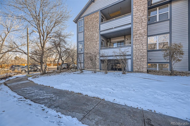 view of snow covered property