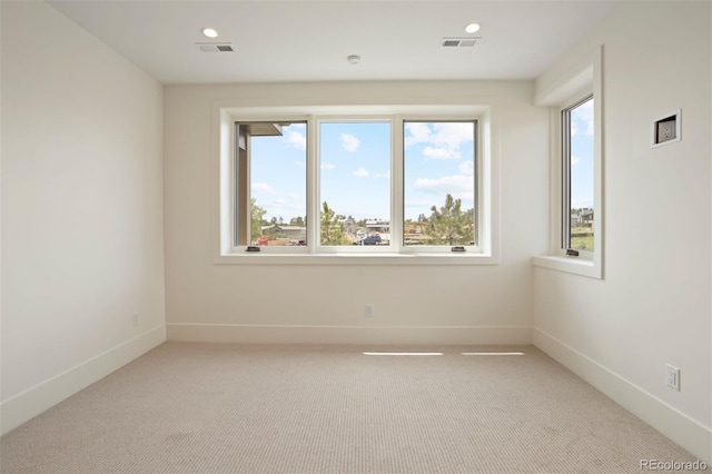 view of carpeted spare room