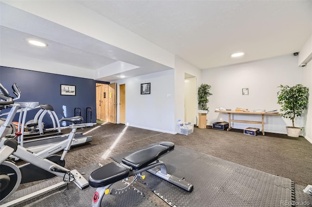 exercise room featuring carpet flooring