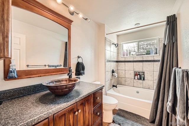 full bath with toilet, tub / shower combination, and vanity