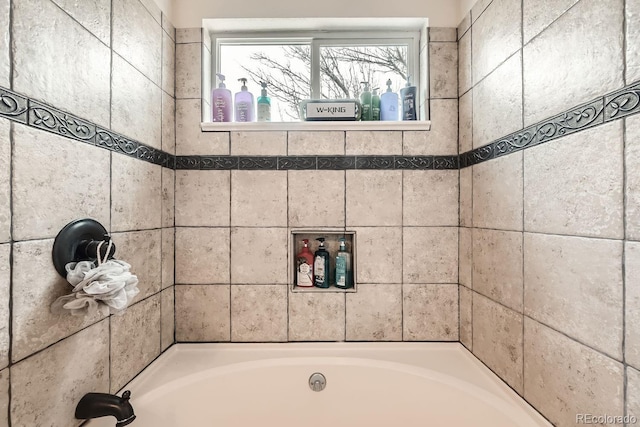 bathroom with a bathing tub