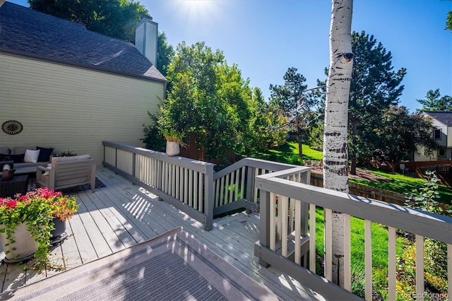 deck with an outdoor hangout area