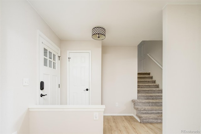 4760 S Wright Way, Morrison, CO 80465 - stairs featuring wood finished floors and baseboards