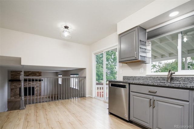 4760 S Wright Way, Morrison, CO 80465 - kitchen featuring dishwasher, gray cabinetry, light wood-style floors, and plenty of natural light