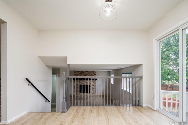 4760 S Wright Way, Morrison, CO 80465 - staircase with wood finished floors and baseboards