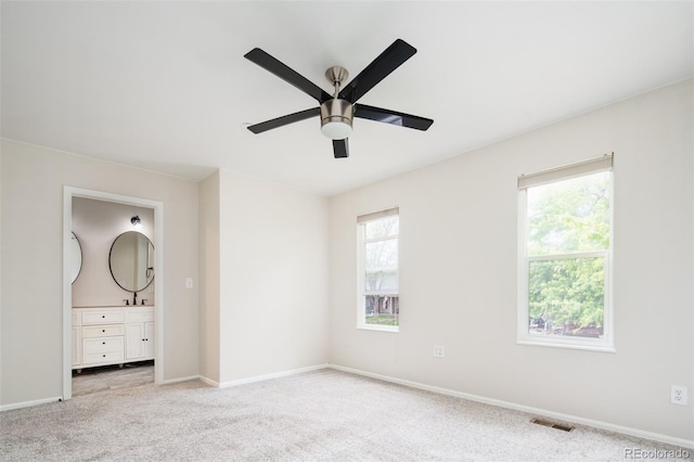4760 S Wright Way, Morrison, CO 80465 - unfurnished bedroom featuring carpet floors, ensuite bath, and ceiling fan