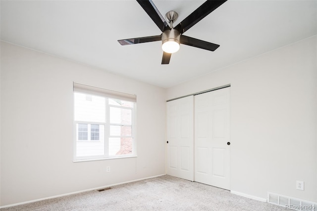 4760 S Wright Way, Morrison, CO 80465 - unfurnished bedroom featuring carpet, a closet, and ceiling fan