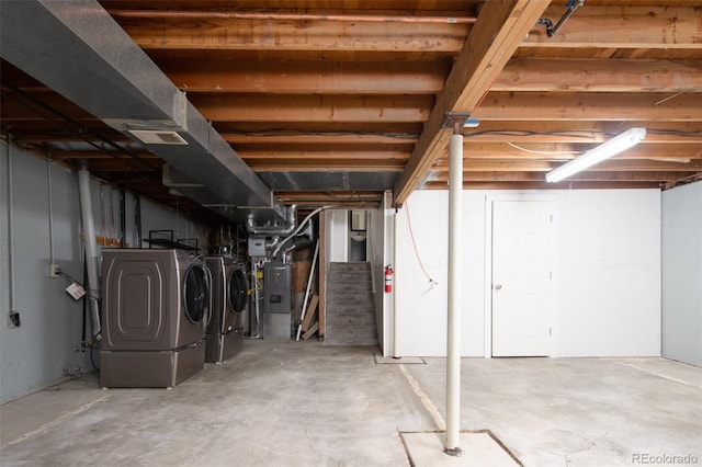 4760 S Wright Way, Morrison, CO 80465 - unfinished below grade area featuring washer and clothes dryer and heating unit