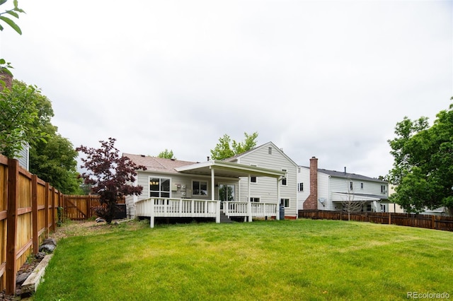 4760 S Wright Way, Morrison, CO 80465 - back of property featuring a fenced backyard and a wooden deck