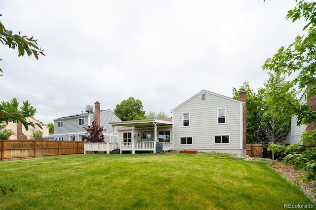 4760 S Wright Way, Morrison, CO 80465 - back of house featuring a wooden deck and a chimney