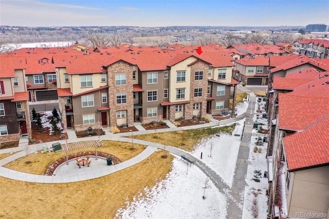 birds eye view of property with a residential view