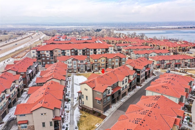 aerial view featuring a water view and a residential view