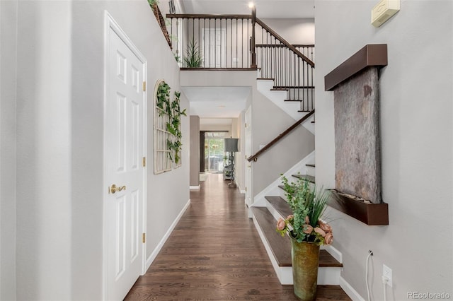 20182 E Maplewood Pl, Centennial, CO 80016 - entrance foyer featuring wood finished floors, stairs, and baseboards