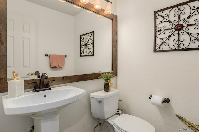 20182 E Maplewood Pl, Centennial, CO 80016 - bathroom with toilet and a sink