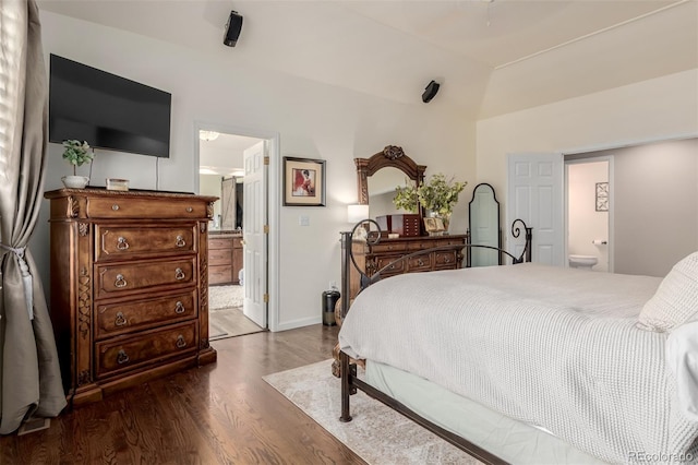 20182 E Maplewood Pl, Centennial, CO 80016 - bedroom featuring ensuite bathroom, wood finished floors, and baseboards