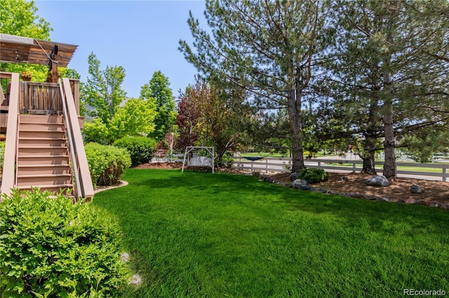 20182 E Maplewood Pl, Centennial, CO 80016 - view of grassy yard with stairs and a deck