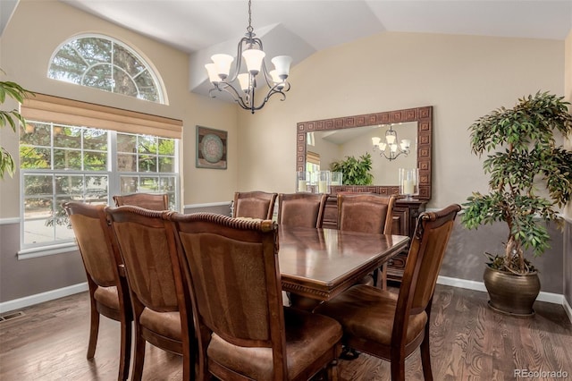 20182 E Maplewood Pl, Centennial, CO 80016 - dining area featuring a chandelier, wood finished floors, lofted ceiling, and healthy amount of natural light