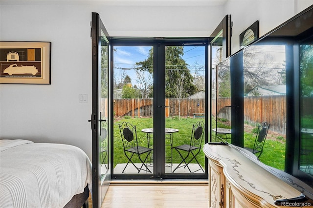 bedroom featuring wood finished floors