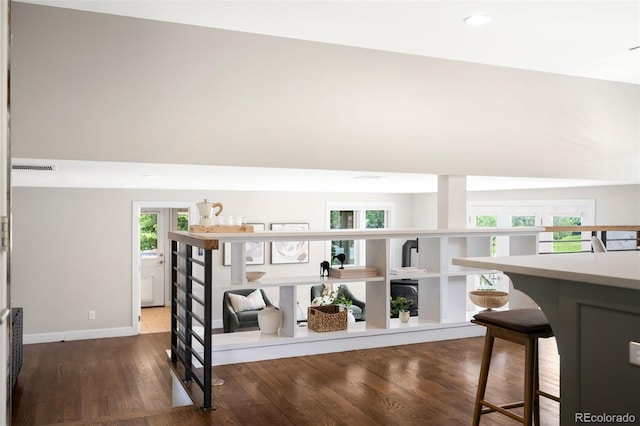 5586 Colorow Dr, Morrison, CO 80465 - staircase with wood finished floors, baseboards, and recessed lighting