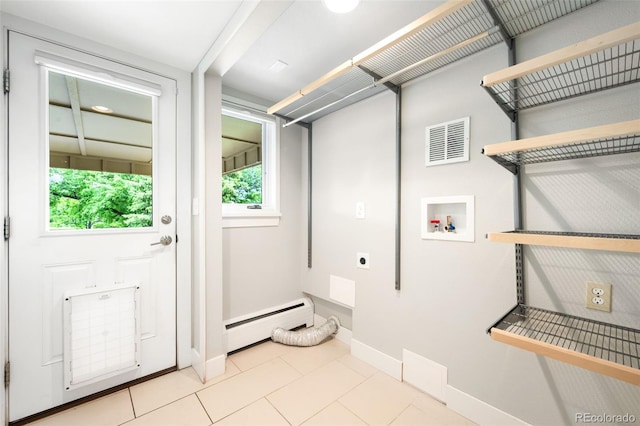 5586 Colorow Dr, Morrison, CO 80465 - laundry area featuring hookup for an electric dryer, a baseboard heating unit, hookup for a washing machine, baseboards, and tile patterned flooring