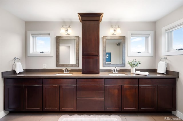 5586 Colorow Dr, Morrison, CO 80465 - bathroom featuring double vanity and tile patterned floors