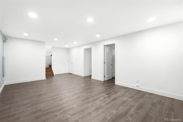 5586 Colorow Dr, Morrison, CO 80465 - empty room with recessed lighting, wood finished floors, baseboards, and stairs