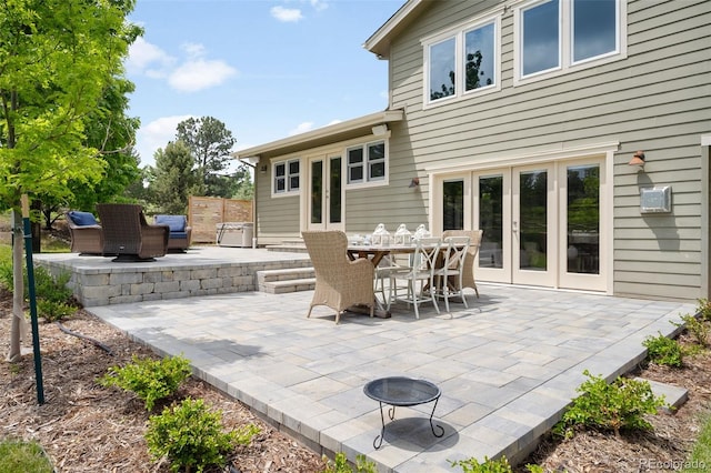 5586 Colorow Dr, Morrison, CO 80465 - view of patio featuring french doors, an outdoor fire pit, and outdoor dining area