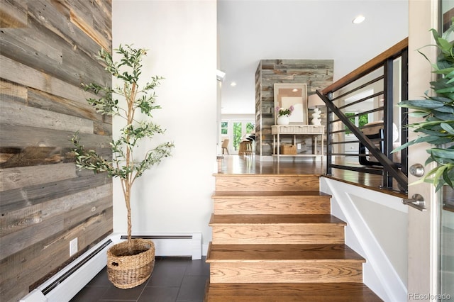 5586 Colorow Dr, Morrison, CO 80465 - stairway featuring a baseboard radiator, tile patterned flooring, and recessed lighting