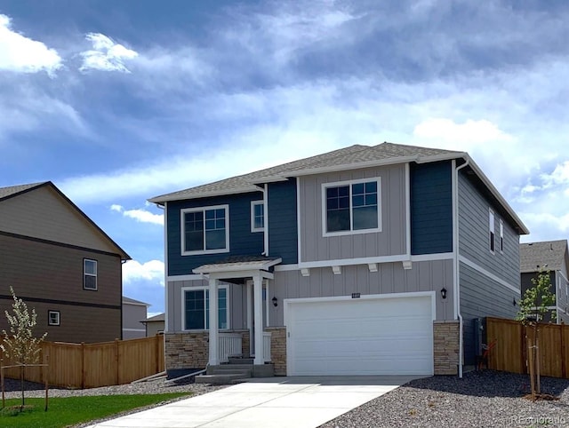 view of front of property with a garage