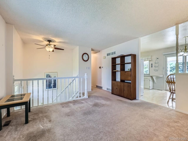 1576 S Ursula Ct, Aurora, CO 80012 - carpeted empty room with a textured ceiling and ceiling fan