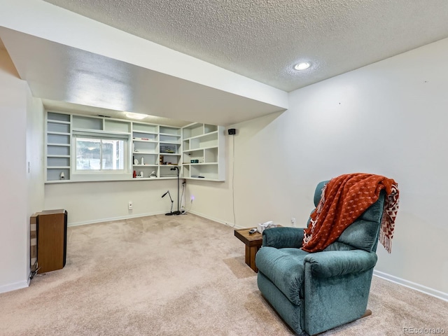 1576 S Ursula Ct, Aurora, CO 80012 - living area with carpet, a textured ceiling, and recessed lighting
