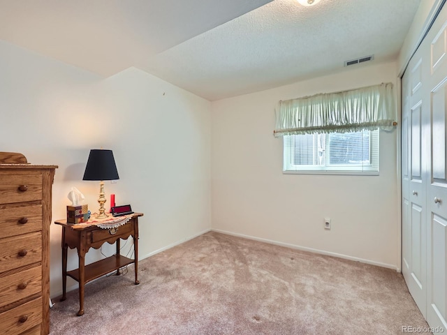 1576 S Ursula Ct, Aurora, CO 80012 - carpeted bedroom with a closet and baseboards
