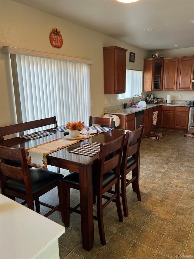 tiled dining area with sink