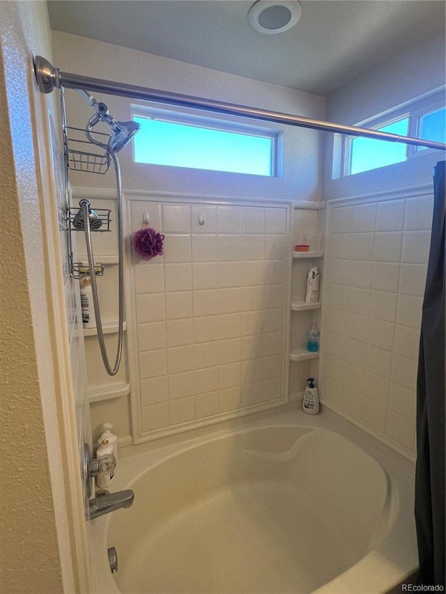 bathroom featuring shower / tub combo