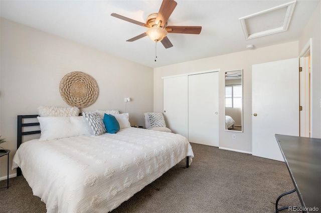 bedroom with ceiling fan, a closet, and dark carpet