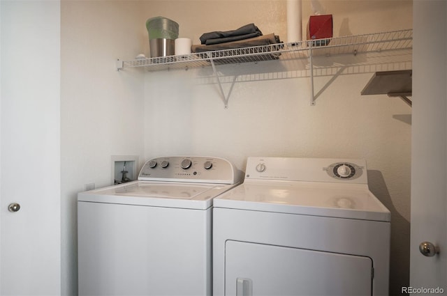 laundry room featuring washer and dryer