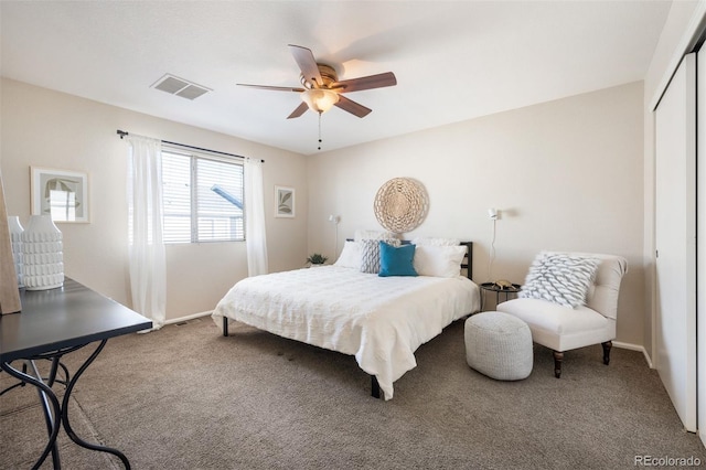 bedroom featuring carpet floors, a closet, and ceiling fan