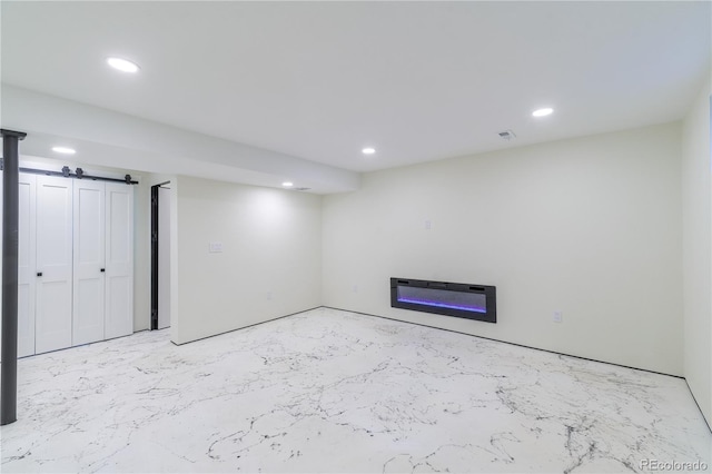 finished basement with recessed lighting