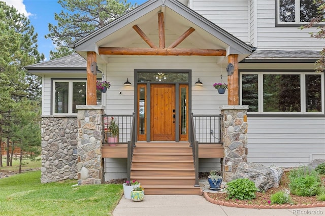 1474 Belford Ct, Evergreen, CO 80439 - property entrance with a shingled roof and a porch