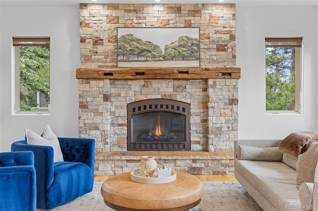 1474 Belford Ct, Evergreen, CO 80439 - living room featuring wood finished floors and a fireplace