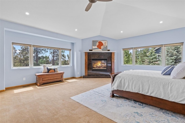 1474 Belford Ct, Evergreen, CO 80439 - bedroom featuring vaulted ceiling, carpet floors, recessed lighting, a tiled fireplace, and a ceiling fan