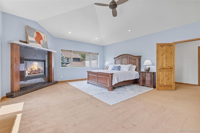 1474 Belford Ct, Evergreen, CO 80439 - carpeted bedroom with vaulted ceiling, a glass covered fireplace, ceiling fan, and recessed lighting